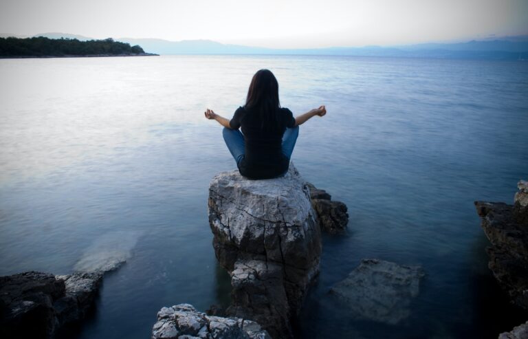 Meditation by the sea at dusk