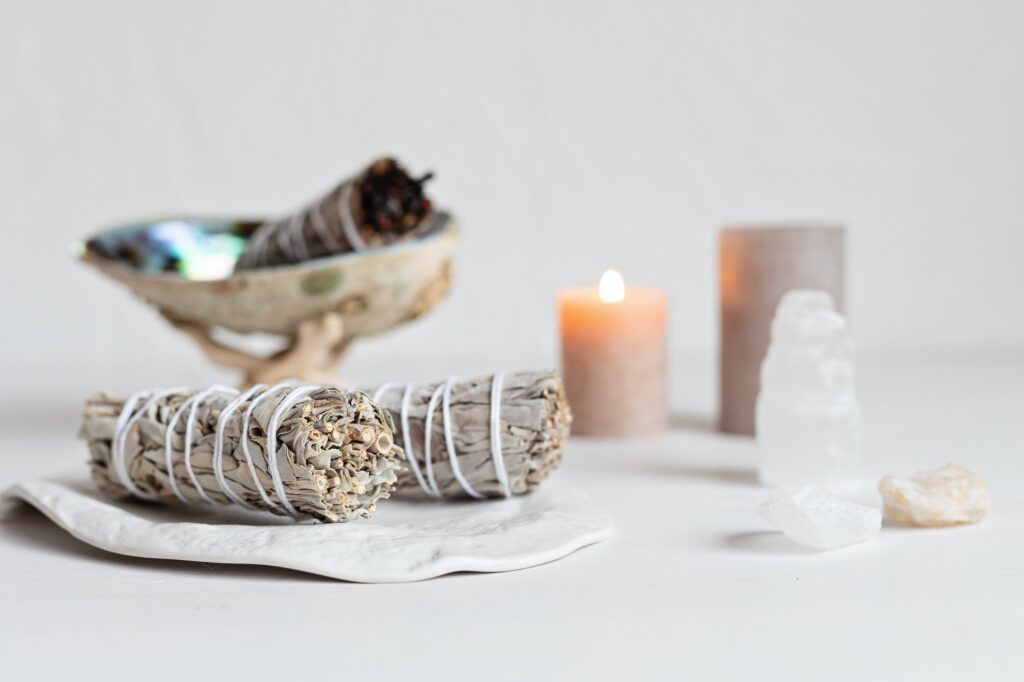 Smudge kit with white sage stick, abalone sea shell. Natural elements for cleansing negative energy